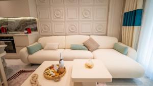 Ruang duduk di Qoople Legend C - apartments in Alanya 100m to the sea
