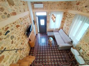 TV a/nebo společenská místnost v ubytování Setoija Guest House