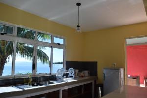 Kuchyň nebo kuchyňský kout v ubytování Baywatch Apartment