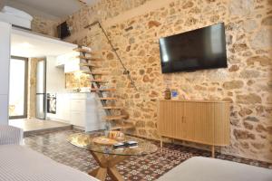 TV a/nebo společenská místnost v ubytování Setoija Guest House