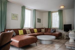 Χώρος καθιστικού στο Ruime villa aan de kust in het prachtige Sint Maartenszee