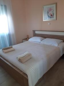 Postel nebo postele na pokoji v ubytování Apartman Barbir