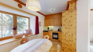 Kuchyň nebo kuchyňský kout v ubytování Apartment Domiziana