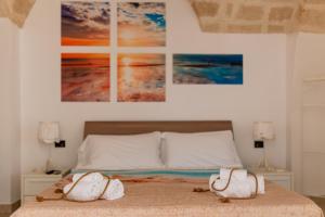 Posteľ alebo postele v izbe v ubytovaní Gioia Casa Vacanze by MONHOLIDAY
