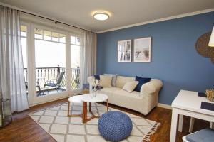 Posezení v ubytování Ferienwohnung mit traumhaftem Meerblick - Haus am Meer FeWo 06
