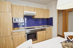 Kuchyň nebo kuchyňský kout v ubytování Ferienwohnung mit traumhaftem Meerblick - Haus am Meer FeWo 06 + 20 fotografií