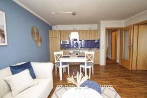 Posezení v ubytování Ferienwohnung mit traumhaftem Meerblick - Haus am Meer FeWo 06