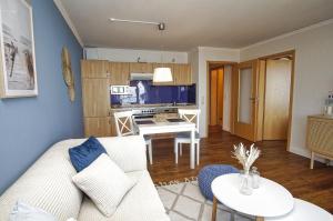 Kuchyň nebo kuchyňský kout v ubytování Ferienwohnung mit traumhaftem Meerblick - Haus am Meer FeWo 06