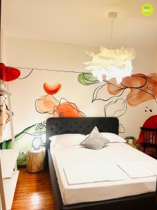 Postel nebo postele na pokoji v ubytování Sleep In Venzone Mitte + 11 fotografií