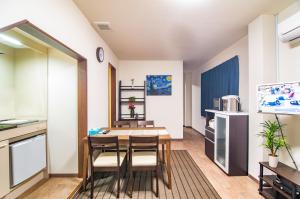 Una cocina o zona de cocina en Aozora