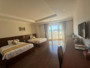 Televisyen dan/atau pusat hiburan di Nha Trang Palace Hotel