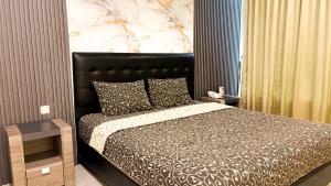 Katil atau katil-katil dalam bilik di UTC Hotel Semarang
