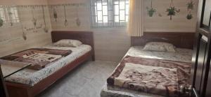 Voodi või voodid majutusasutuse Kim Tuyến Hostel - Only accept Vietnamese customers toas