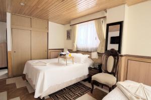Postel nebo postele na pokoji v ubytování Hotel Inter Bogotá + 37 fotografií