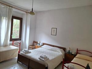 Postel nebo postele na pokoji v ubytování Hotel Moderno