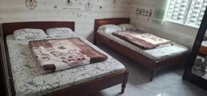 Voodi või voodid majutusasutuse Kim Tuyến Hostel - Only accept Vietnamese customers toas