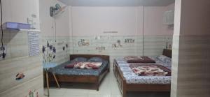 Voodi või voodid majutusasutuse Kim Tuyến Hostel - Only accept Vietnamese customers toas