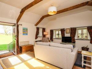 Televiisor ja/või meelelahutuskeskus majutusasutuses The Mill