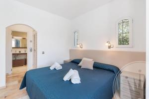 Łóżko lub łóżka w pokoju w obiekcie La Manga Club Resort - Individual Villa 524