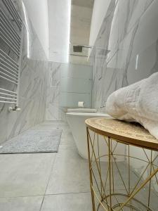 Ένα μπάνιο στο Amalè suite Gardenia 9