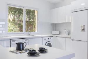Kuchyň nebo kuchyňský kout v ubytování Monte Verde 10C Apartment