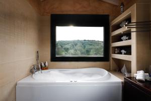 Koupelna v ubytování Aphaia Home