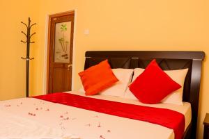 Voodi või voodid majutusasutuse Peacock Resort toas