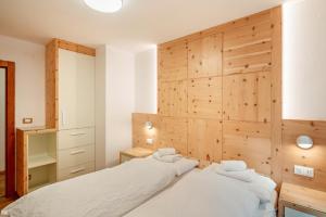Letto o letti in una camera di Chalet Buffaure a Parte
