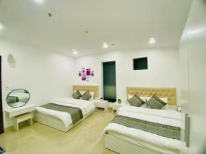 Postel nebo postele na pokoji v ubytování Diva Hotel