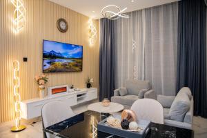 Televisyen dan/atau pusat hiburan di Unreal Homes