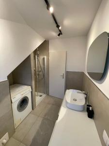 Koupelna v ubytování Wohnen beim Klabautermann mit Südbalkon