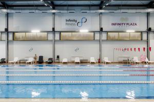 a view of a swimming pool at Infinity Plaza Hotel Block 2 in Atyrau