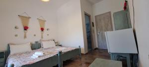 Imagine din galeria proprietății Roptro Rooms în Parga +11 fotografii