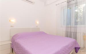 Postel nebo postele na pokoji v ubytování Apartment Augusta Senoe V