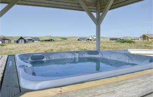 a hot tub sitting on top of a table at Holiday Home Gloryvej Harboøre Iv in Harboør