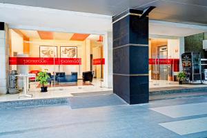 a lobby of a building with a store at Dancenter Promenade Near Cihampelas Walk in Bandung