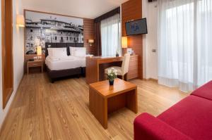 Postel nebo postele na pokoji v ubytování Best Western Hotel Adige