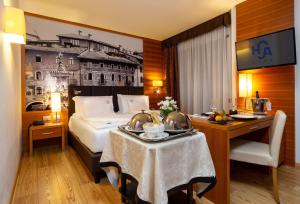 Postel nebo postele na pokoji v ubytování Best Western Hotel Adige