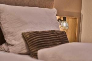 En eller flere senge i et værelse på Ferienwohnungen Kuchler