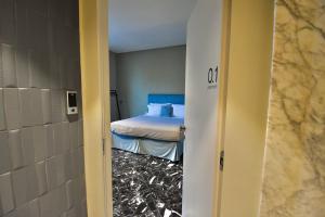 Voodi või voodid majutusasutuse MpiuT - Housea toas