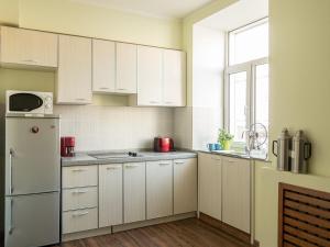 Virtuvė arba virtuvėlė apgyvendinimo įstaigoje Zaya Guest House