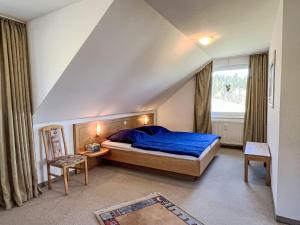 Ένα ή περισσότερα κρεβάτια σε δωμάτιο στο Apartment Schwarzwaldblick IV by Interhome