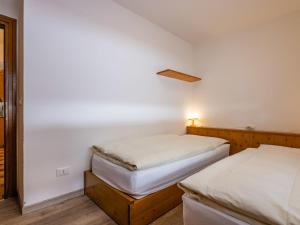 Posteľ alebo postele v izbe v ubytovaní Apartment Cesa Micheluzzi - CZI712 by Interhome