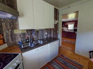 Køkken eller tekøkken på Holiday Home Suviranta by Interhome