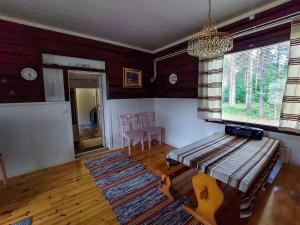 Et opholdsområde på Holiday Home Suviranta by Interhome