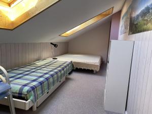 Postel nebo postele na pokoji v ubytování Apartment Arlette Nr- 30 by Interhome