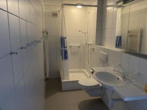 Koupelna v ubytování Apartment Arlette Nr- 30 by Interhome