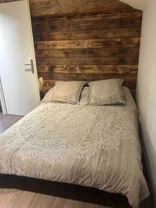Postel nebo postele na pokoji v ubytování L'Industriel