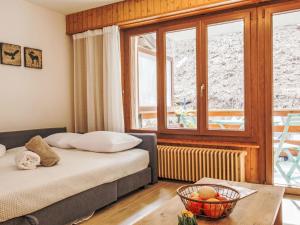 Ένα ή περισσότερα κρεβάτια σε δωμάτιο στο Studio Quille du Diable 4 by Interhome