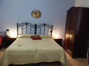 Posteľ alebo postele v izbe v ubytovaní Locanda Scirocco
